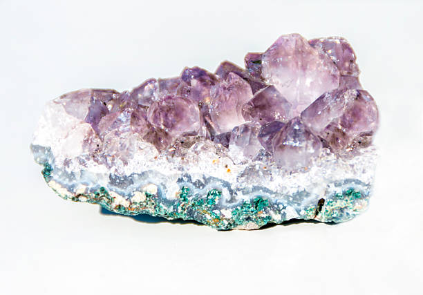 Natural mineral amethyst. Semi-precious multi-colored stones, minerals close-up. Mineralogy. Collection of minerals.
