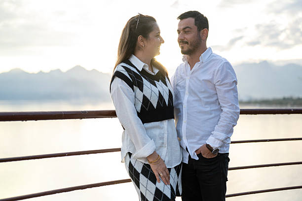 istock Happy couple spending emotional time on balcony 2247266145
