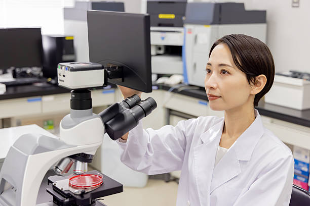istock Asian man in a white coat working in a laboratory 2247270403