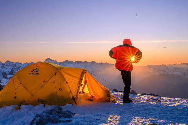 istock Mature Caucasian Mountaineer Embracing Sunrise at Himalayan Base Camp 2247270458