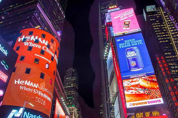 New York. USA. 09.15.2024. Night view of bright digital billboards advertising \