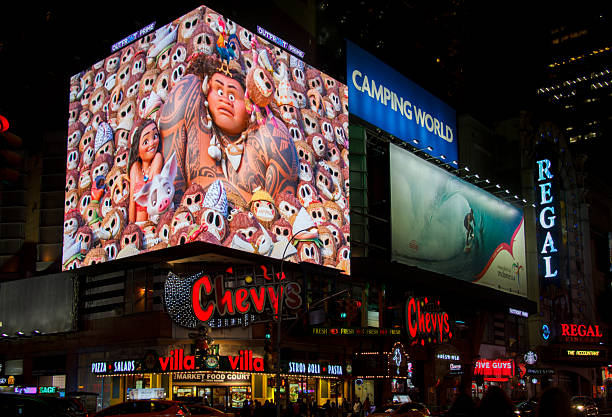 The Times Square with its billboards at night in Midtown Manhattan,  New York City, USA