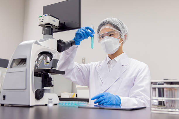 istock Asian man in a white coat working in a laboratory 2247271802