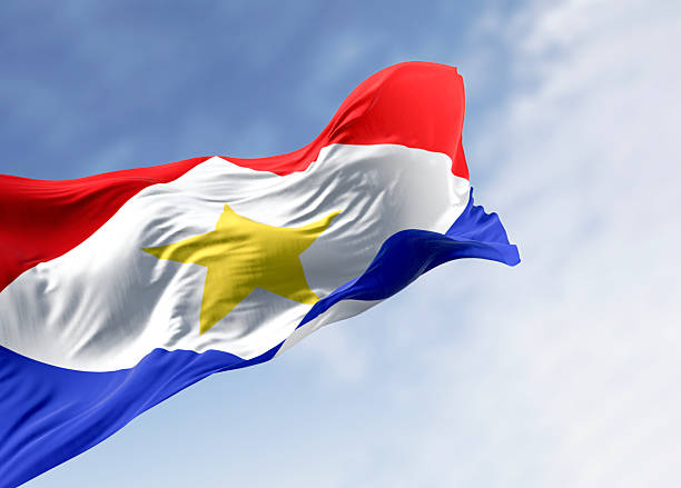 Saba national flag waving in the wind. Island in the Dutch Caribbean and is a special municipality in the Netherlands. 3d illustration render. Fabric textured background. Selective focus
