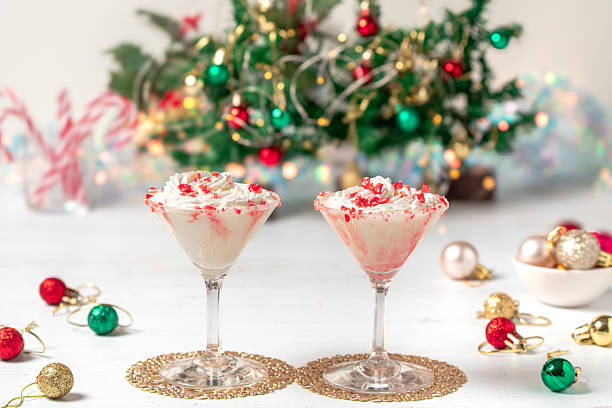 istock White chocolate peppermint martini with candy cane rim. 2247274950