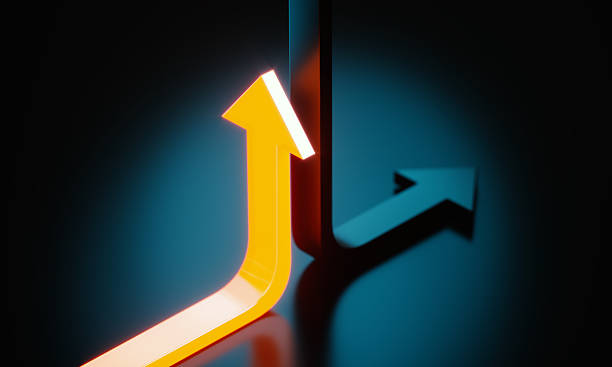 istock Yellow And Black Colored Arrows Moving Up And Down In Opposite Directions On Black Background 2247276306