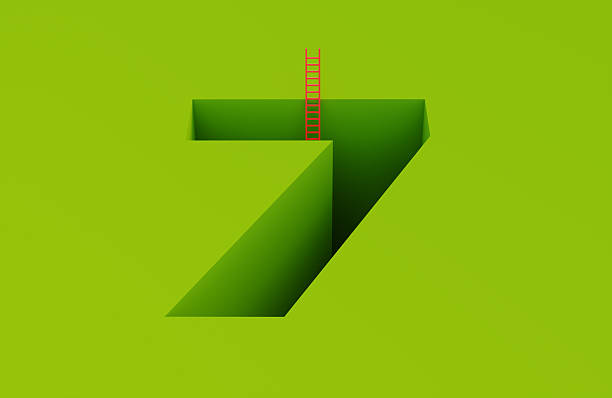 Red ladder and green cutout number 7 shape on green background. Solution and success concept.