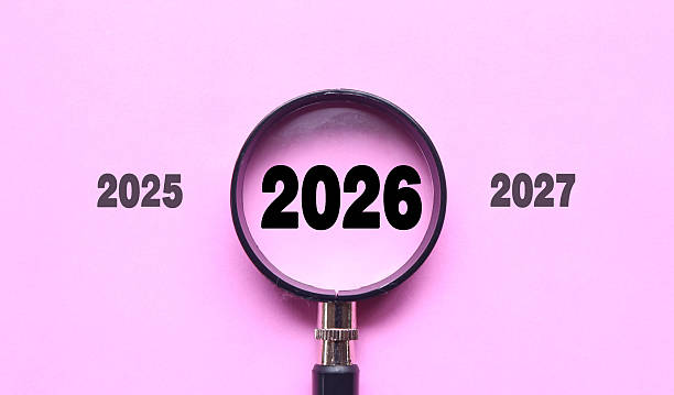 istock New Year 2026 is enlarged using a magnifying glass. 2026 highlighted through a magnifying glass, with 2025 and 2027 displayed on each side 2247276816