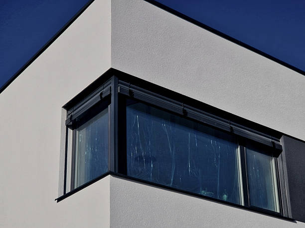 istock Corner windows are available with special corner exterior blinds, which are designed to eliminate the need for an unsightly guide rail right in the corner, ensuring a clear view. The slats are coupled 2247277542