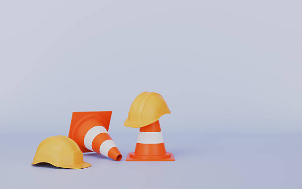 istock Construction Safety Cones and Helmets on Blue Background 3d illustration 2247281287