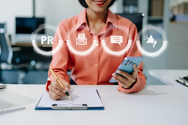 istock PR, Public relations concept. hands using laptop and tablet with public relations icon for communication advertising marketing strategy. with Ads and sales 2247281970