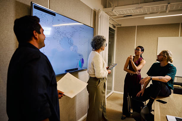 istock Diverse business team collaborating using ai on a global marketing strategy 2247282301