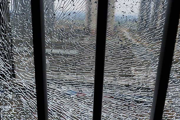 Broken window glass of modern apartment