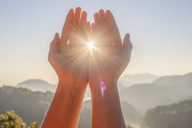 istock Human hands open palm up worship. symbolizing peace and hope 2247289776