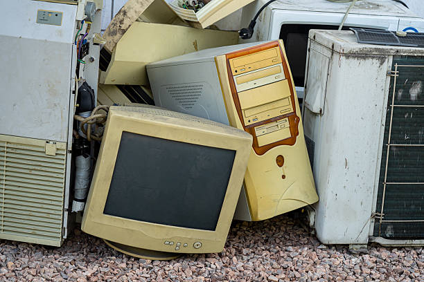 istock Old computer set be mix up with pile of electrical appliances waste 2247291442
