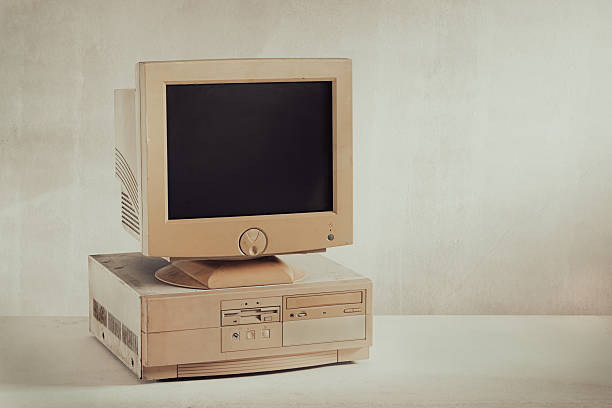 istock Old and obsoleate personal computer on grunge floor and background 2247291519