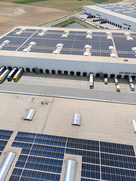 istock Logistics center  with solar panels on roofs. Aerial view. A modern warehouse 2247293411