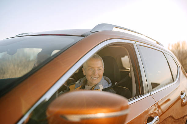 istock Couple enjoying car ride together on a sunny day 2247296076