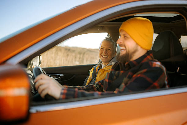 istock Couple enjoying car ride together on a sunny day 2247296079