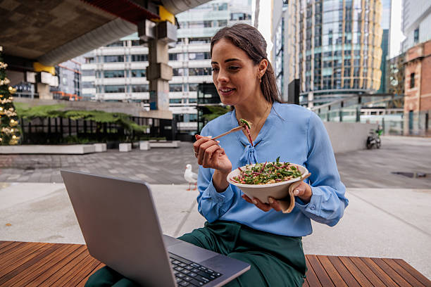 istock Businesswoman Working Outdoors During Lunch Break 2247297059