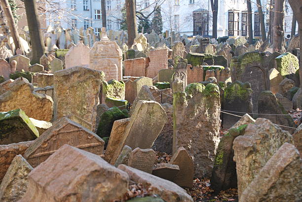 istock Overcrowded Historical Headstones Dusted with Snow at Old Jewish Cemetery 2247298971