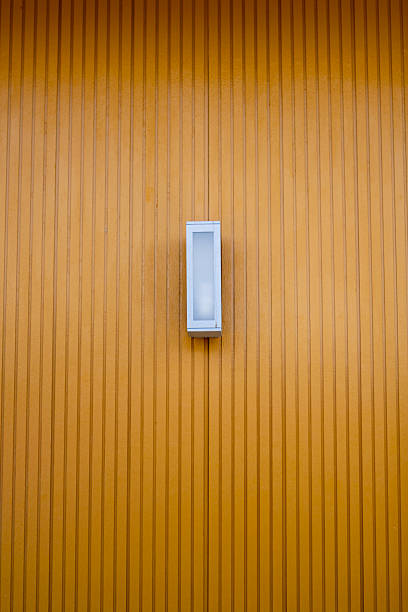 istock Minimalist wall lighting fixture vibrant yellow panel interior design modern space aesthetic view 2247303896