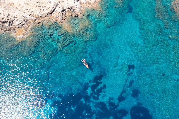 istock Boat Floating on Crystal Clear Waters, Naxos 2247304053