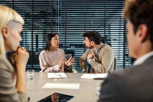 istock Business professionals discussing strategy during office meeting 2247304145