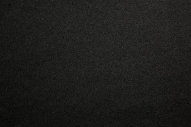 istock Black paper wallpaper with noise and grains texture 2247305946