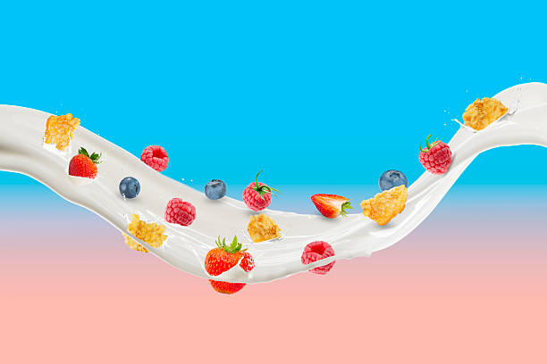 istock Milk Splash With Corn Flakes, Raspberry, Blueberry, and Strawberry 2247314342