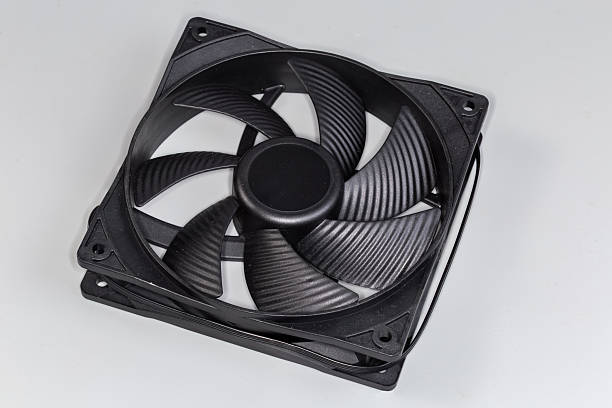 istock Fan of cooling system of computer case on gray background 2247314369