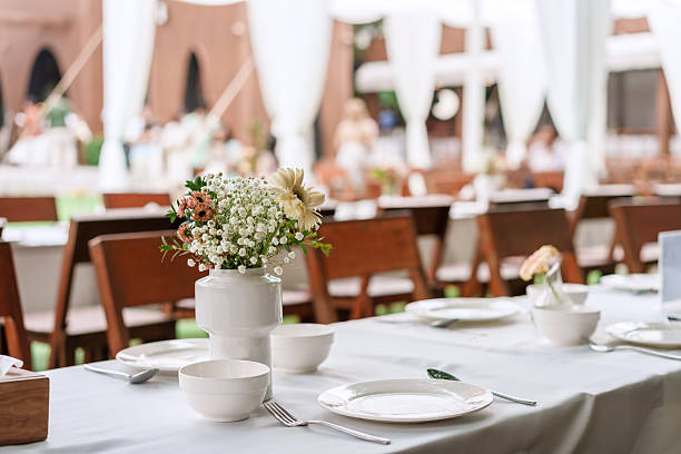 istock Outdoor wedding dinner table reception in romantic garden wedding atmosphere 2247317715