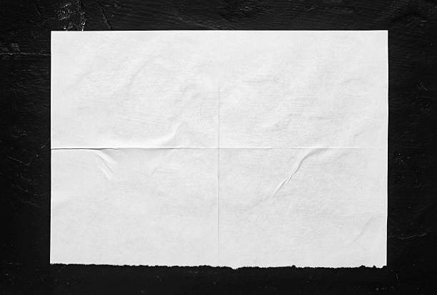 istock white poster with folds on a black background 2247318918