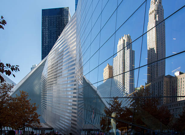 The Oculus World Trade Center Modern architecture  reflected in office buildings in the financial district, Lower Manhattan, New York City, USA