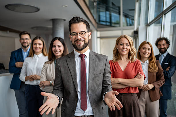 istock Business leader welcoming diverse professional team in office 2247320495
