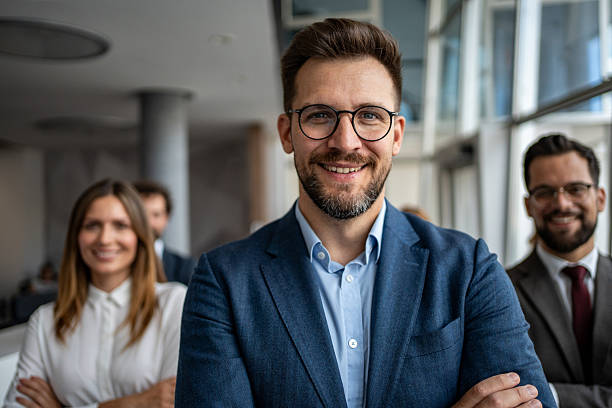 istock Successful business team standing in modern office 2247320606