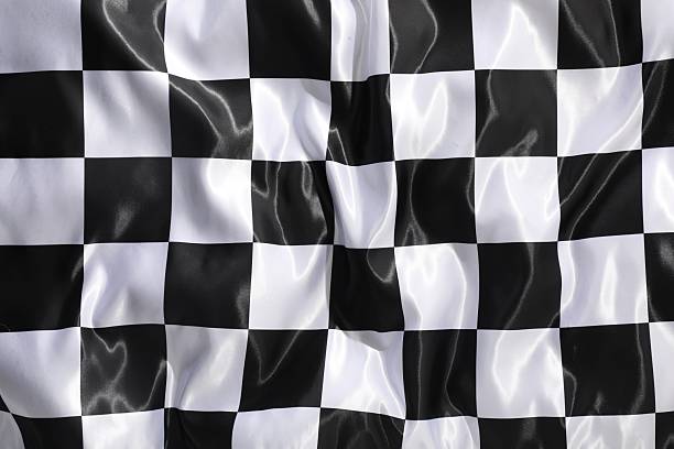 istock Checkered finish flag as background, top view 2247320654