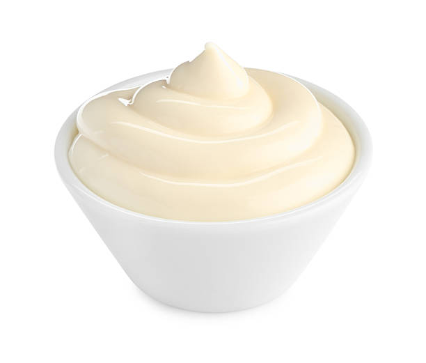 istock Tasty mayonnaise sauce in bowl isolated on white 2247325013