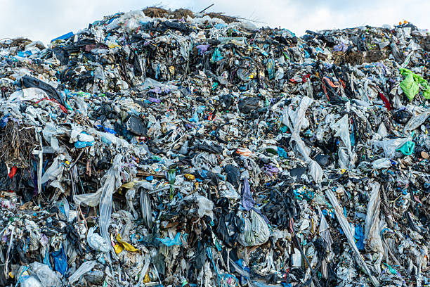 istock Mountains of waste at a landfill site under cloudy skies highlight environmental challenges faced by urban areas 2247326711