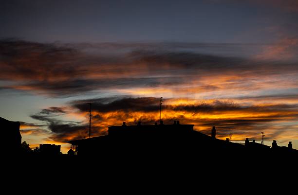 sunset over residential buildings