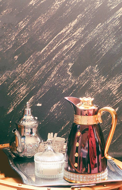Serving Tea in a Tradional Teapot, El Menia, Algeria