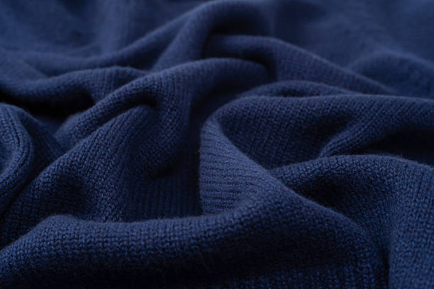 istock Navy blue merino wool sweater texture as background. Top view. 2247336275