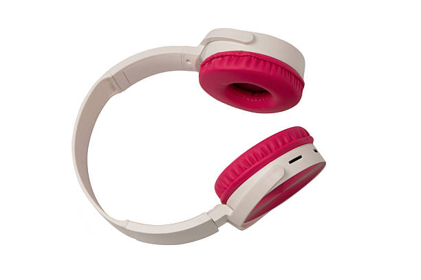 istock Pink and white headphones isolated on white background. 2247336291