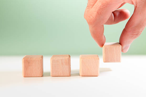 istock Hand arranging wooden block stacking as step stair, business growth concept. 2247336398
