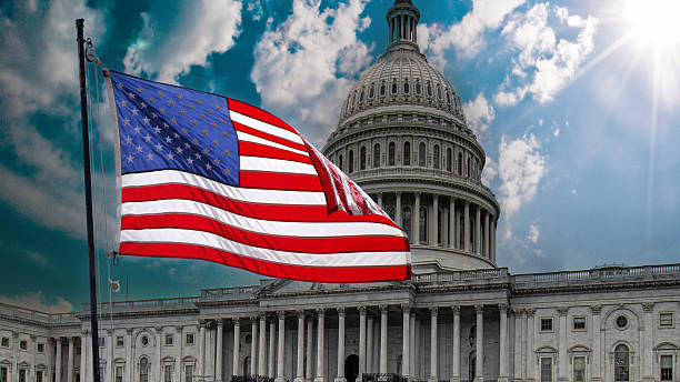 istock US flag over government building in Washington, DC 2247338562