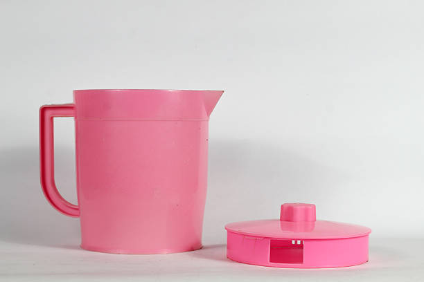 istock Bright pink pitcher and lid create a vibrant accent for your kitchen or party setup, ready to serve refreshing drinks with a playful and modern touch 2247340588
