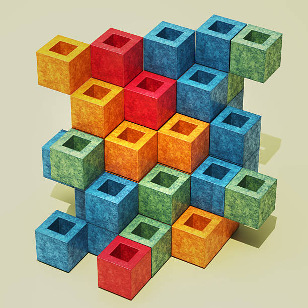 Brightly colored cubes stack together, creating a 3D pattern. The arrangement features shades of blue, red, orange, and yellow with a textured surface. Light plays across the shapes.