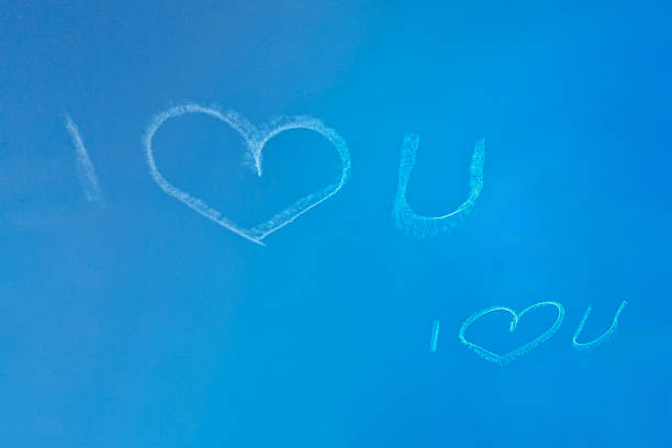 Aircraft draw a heart in the sky. Love concept for traveling the world