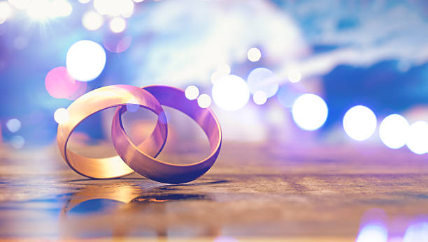 istock Still life of gold wedding rings.3d illustration 2247350366