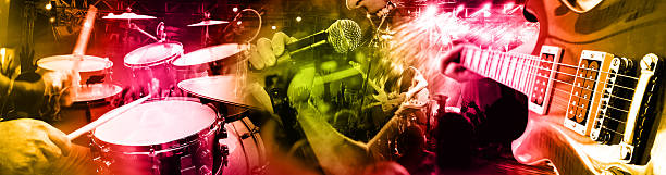 Rock band performing and thanking audience on nightclub